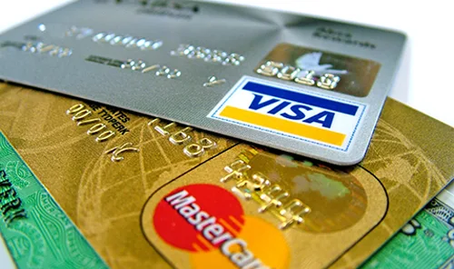 Credit card use is down - which may aid property buyers